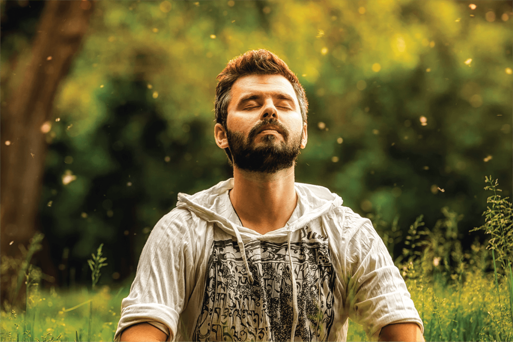 Man Meditating Outdoors | Veritas Farms