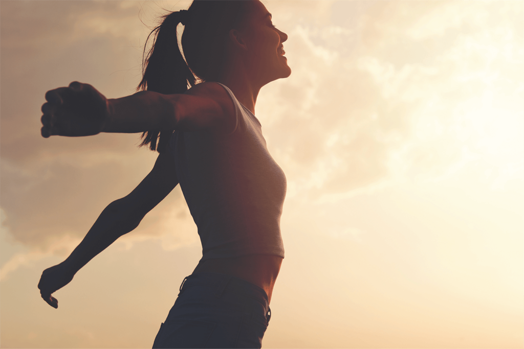 Woman with Open Arms Enjoying the Outdoors | Veritas Farms