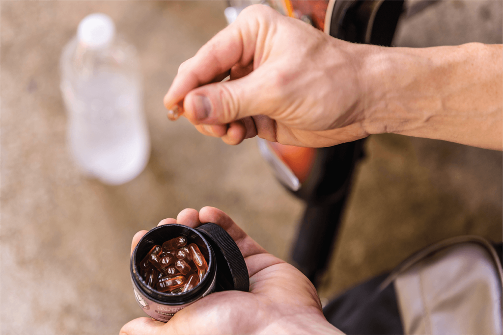 Person Taking Veritas Farms Capsules | Veritas Farms